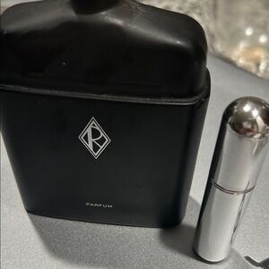 Black Parfum Bottle with Silver Travel Spray
